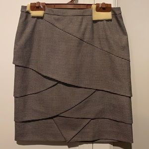 Adorable for work with a black blouse.